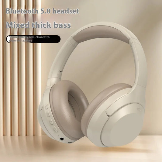 Beige Bluetooth headset with text on a neutral background