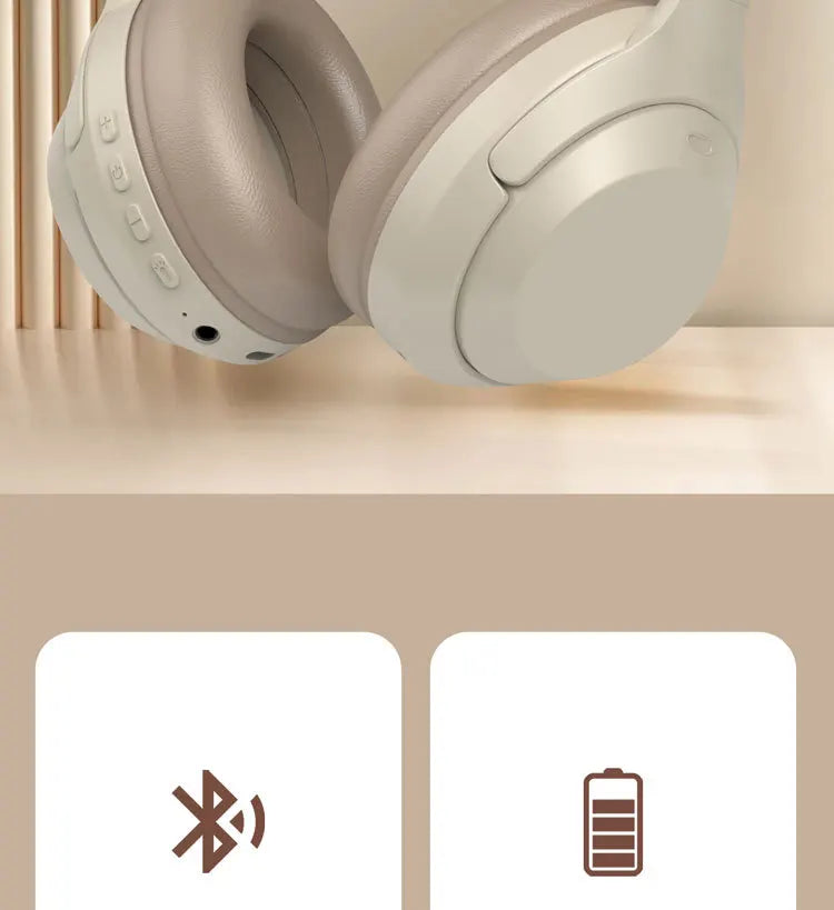 Beige wireless headphones with Bluetooth and battery icons below.
