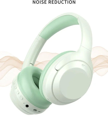 Mint green headphones with noise reduction feature on a white background