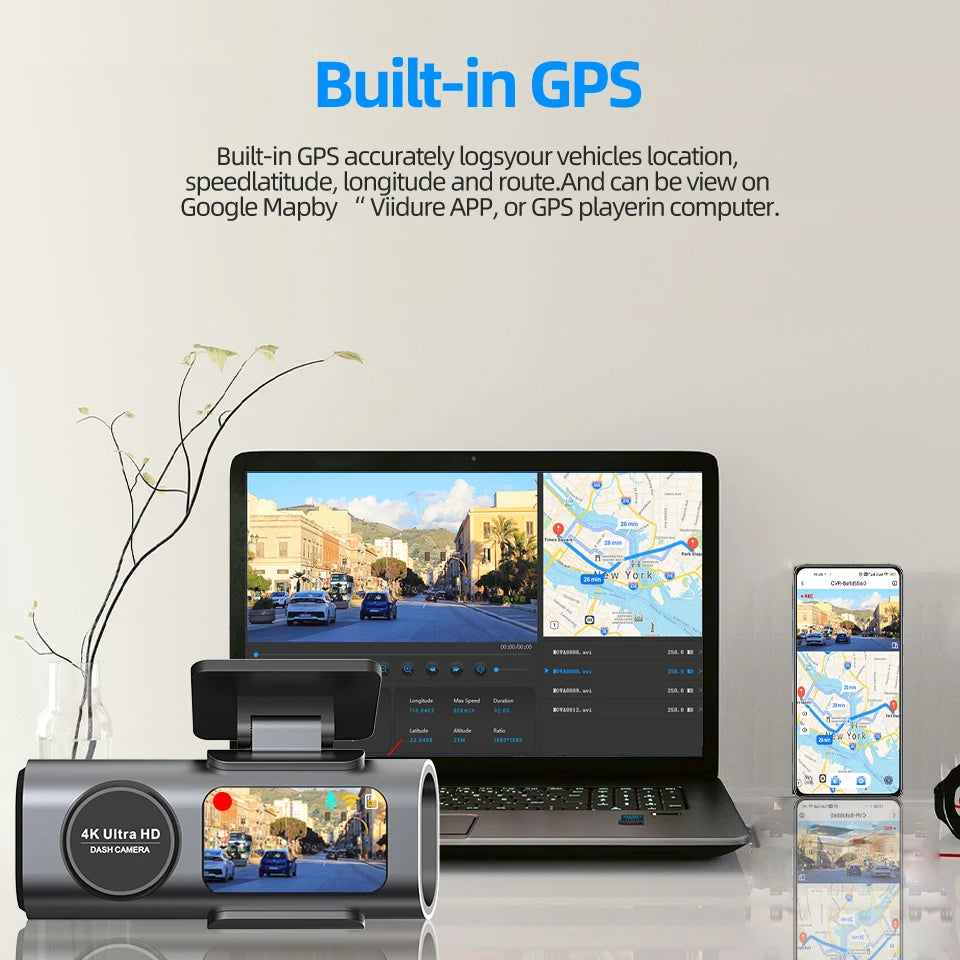 Laptop with built-in GPS displaying a map, accompanied by a dashboard camera and smartphone showing maps.