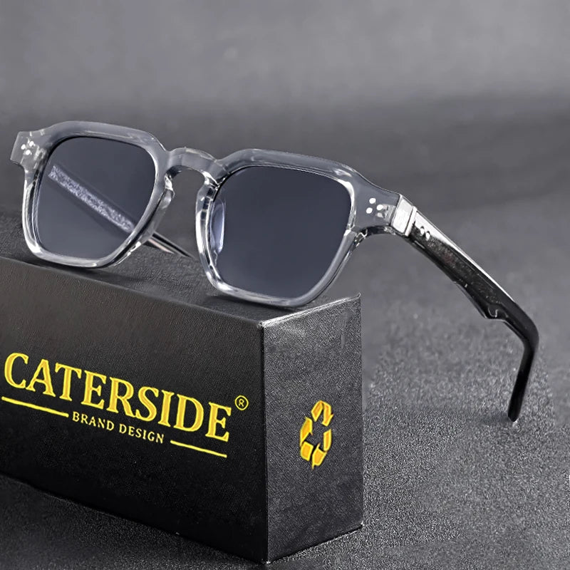 Clear-framed glasses on a black box with 'Caterside' branding.